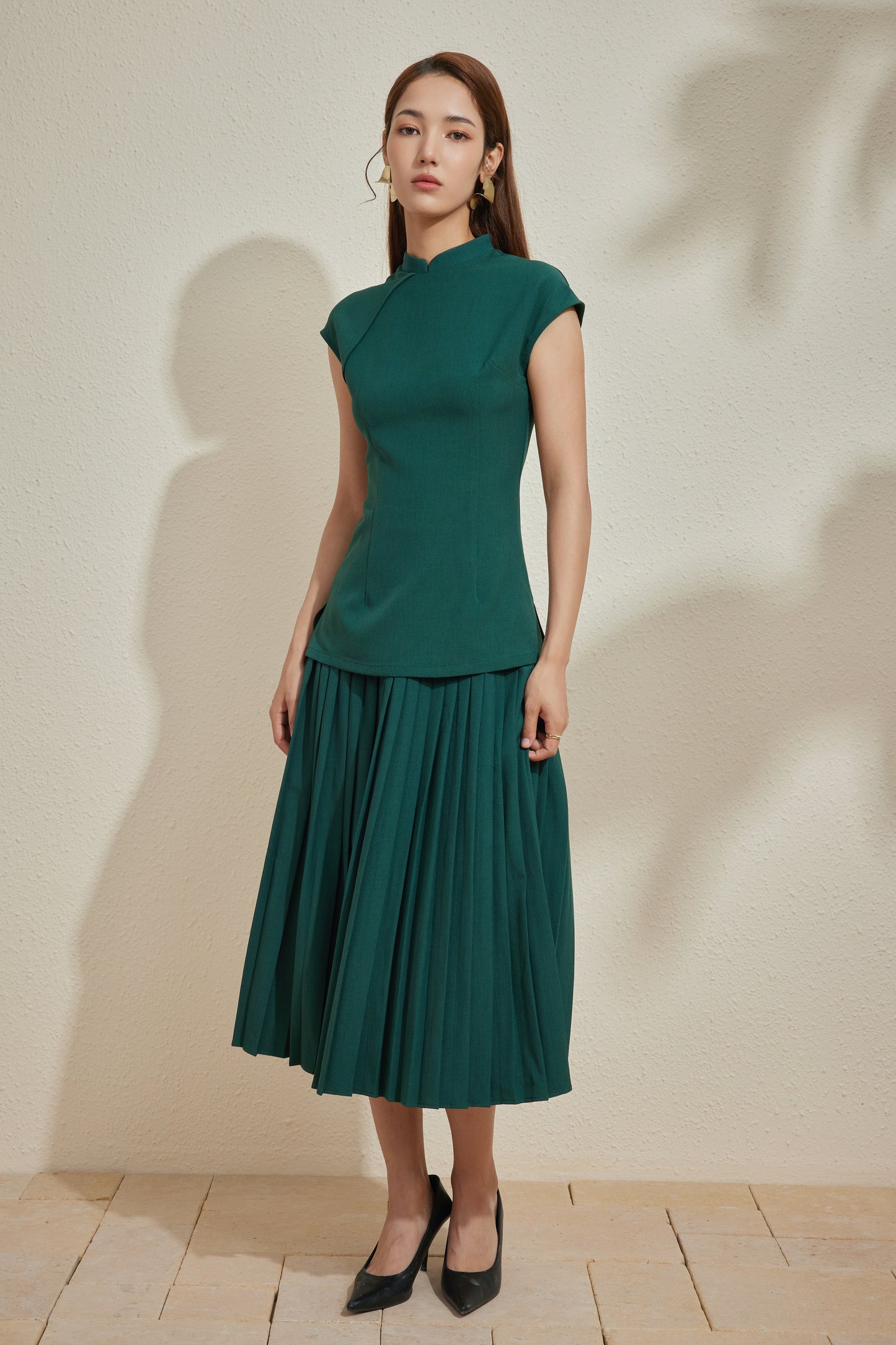 PLISSER SKIRT IN BLACK FOREST