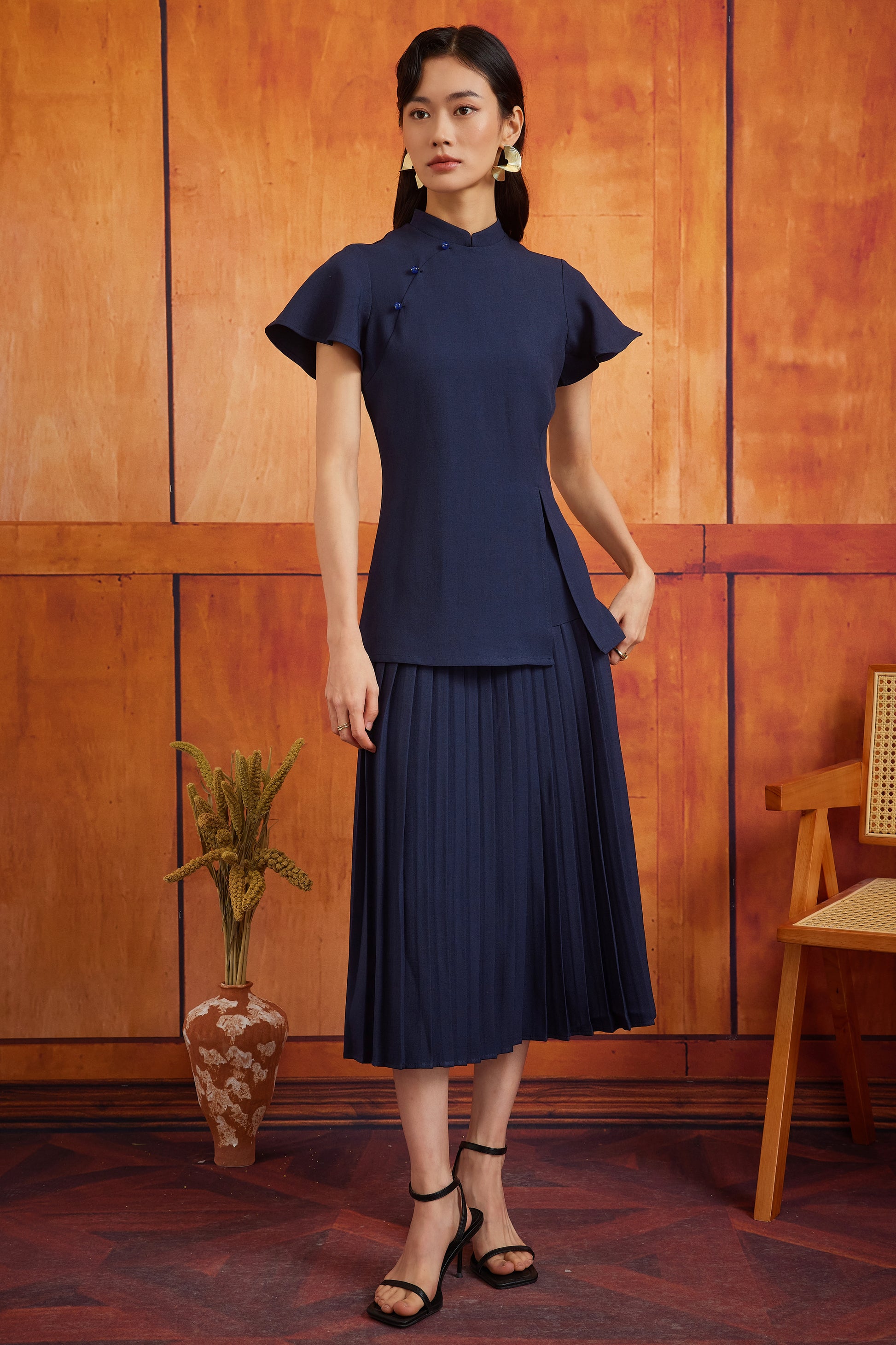 PLISSER SKIRT IN MIDNIGHT DREAM