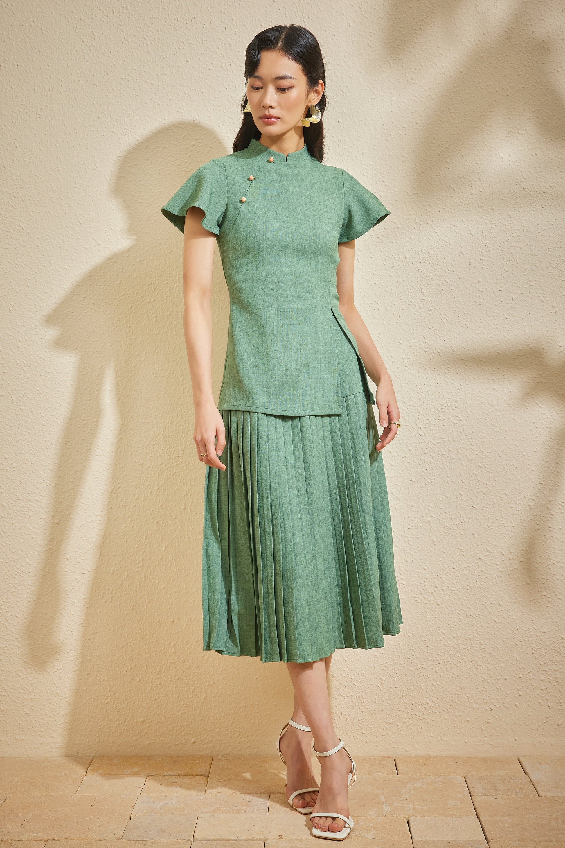PLISSER SKIRT IN SOFT JADE