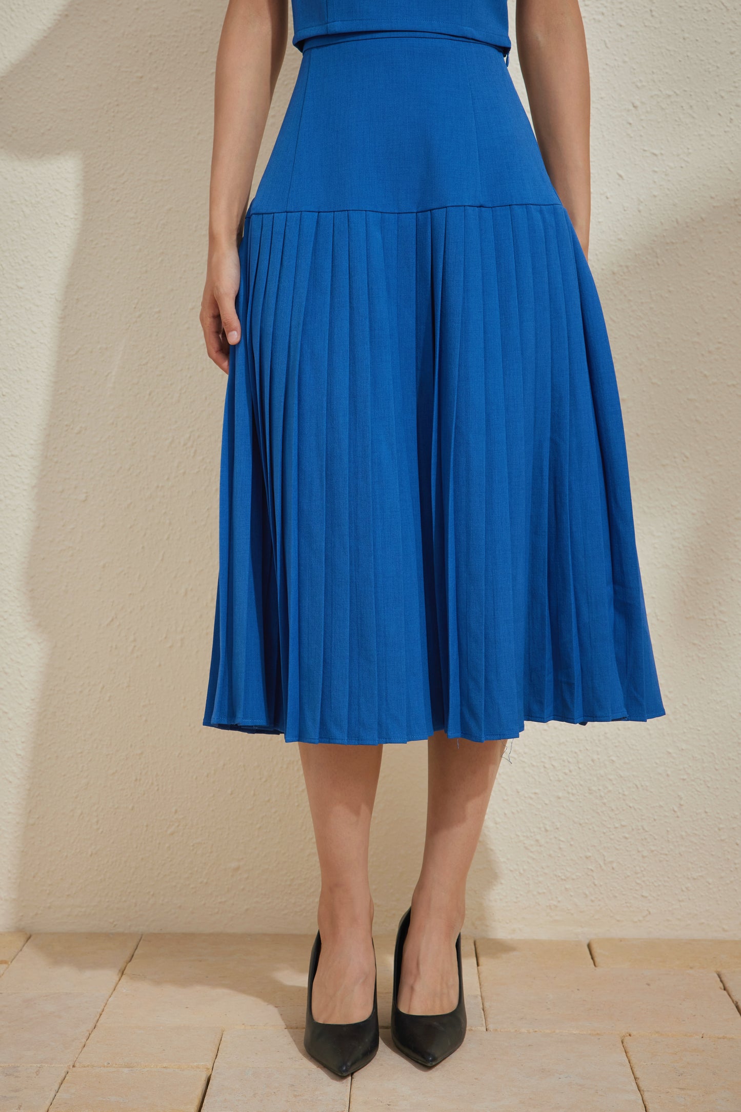 PLISSER SKIRT IN DARK SAPPHIRE